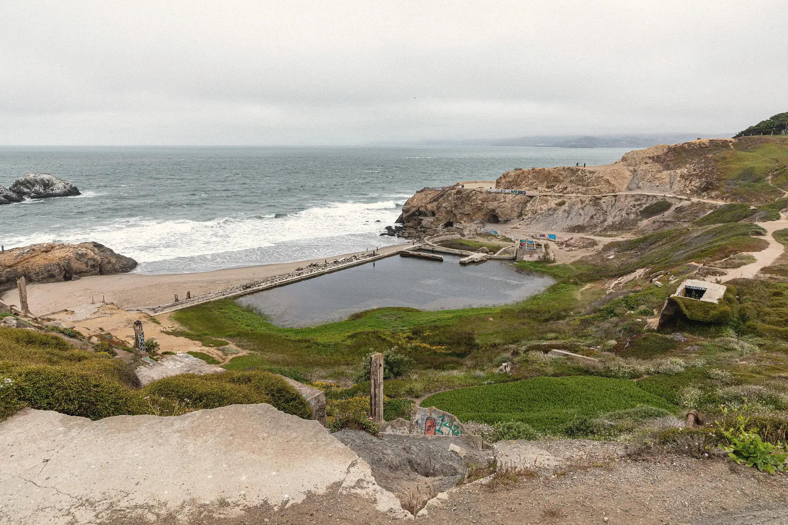 Photo of the Sutro Baths ruins and the ocean on a grey day